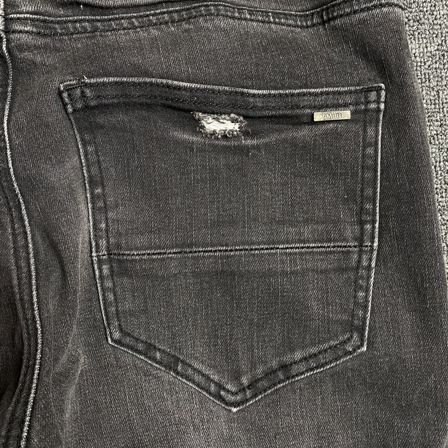 AMIRI SLASH SLIM JEANS
